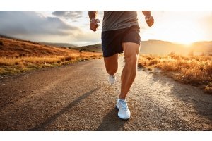Runner on a sunny country road in nature, symbolizing sports, endurance, and muscle recovery with magnesium