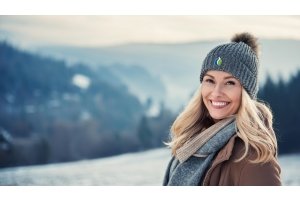 cheerful woman in winter landscape