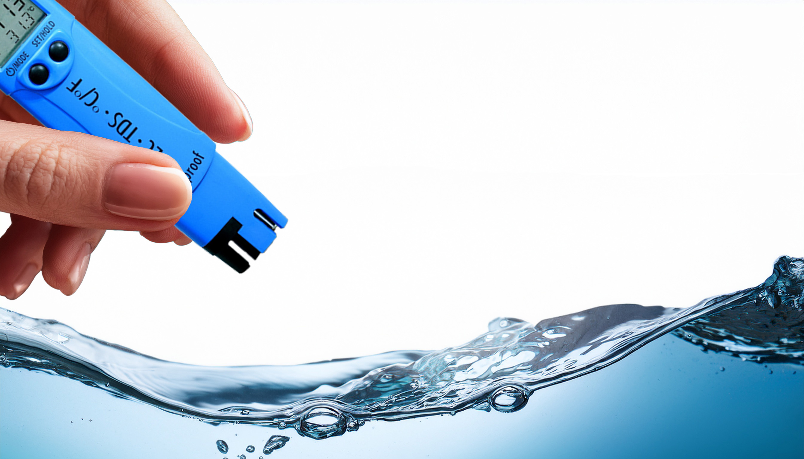 Hand holding a digital TDS meter measuring water quality – TDS testing for pure drinking water at Meditech Europe